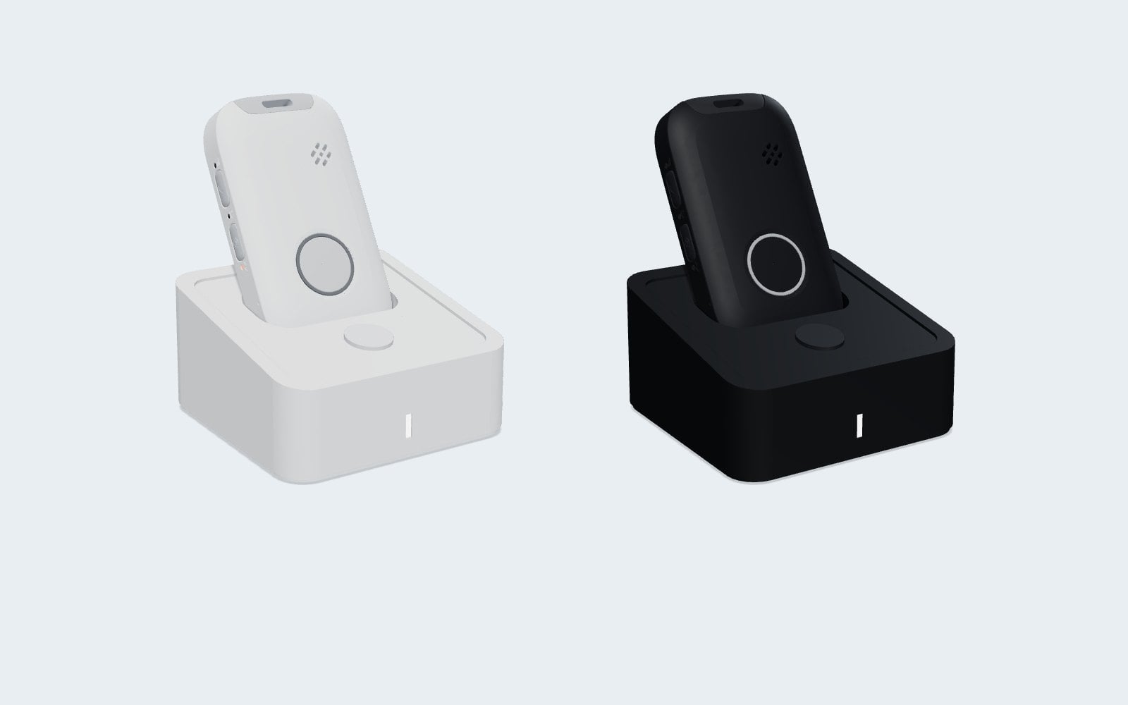 Safe-Life Signal medical alert pendant in its charging dock, shown in white and black
